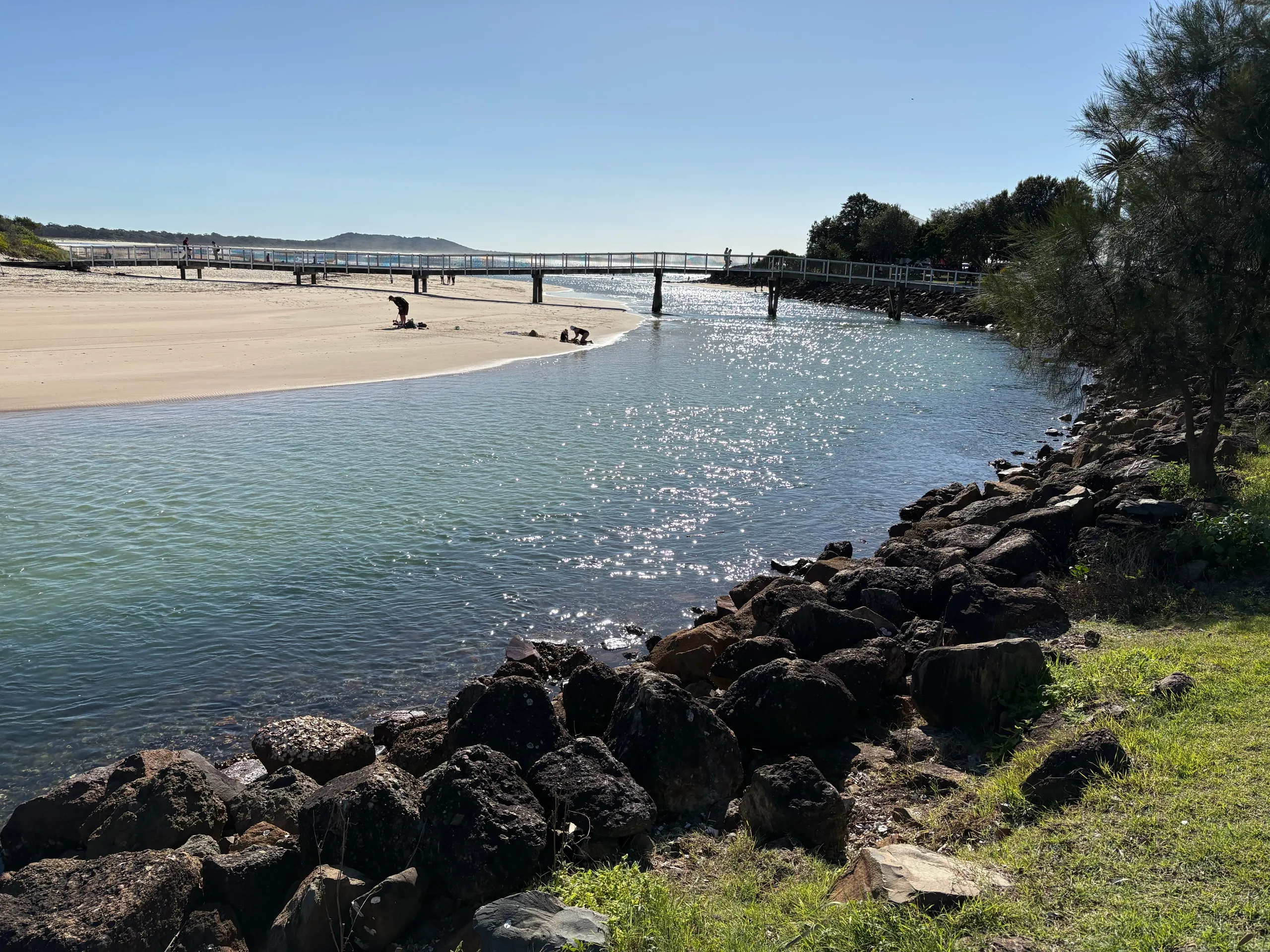 The footbridge over Killick Creek with a sandy spit at Crescent Head