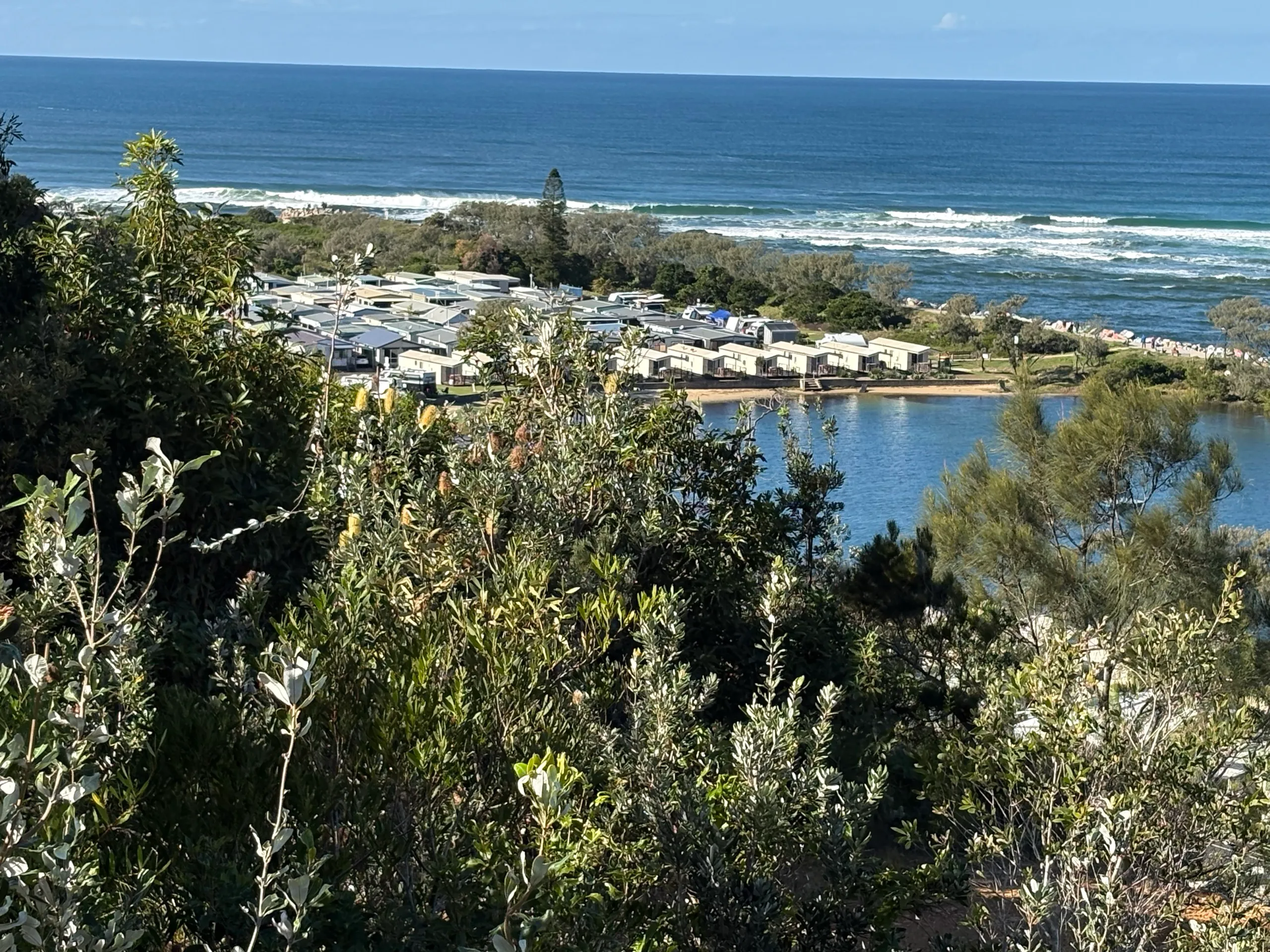 A beachside holiday park tucked between the river and the surf at Nambucca Heads