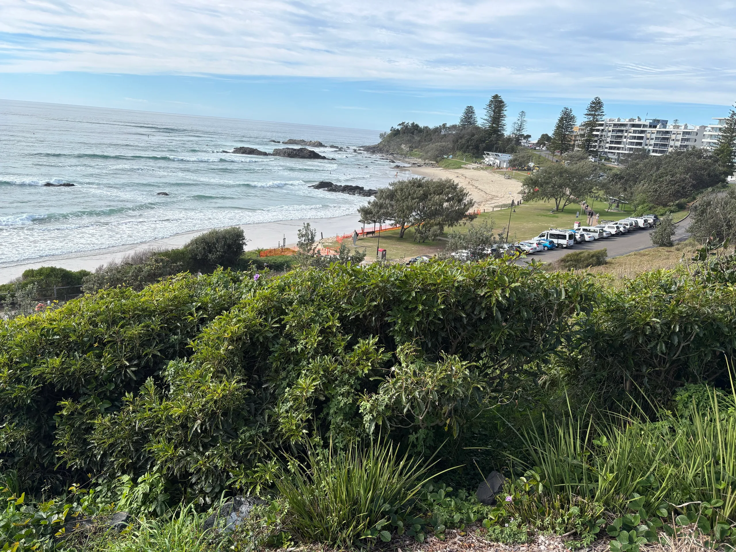 A surf beach below headland apartments at Port Macquarie