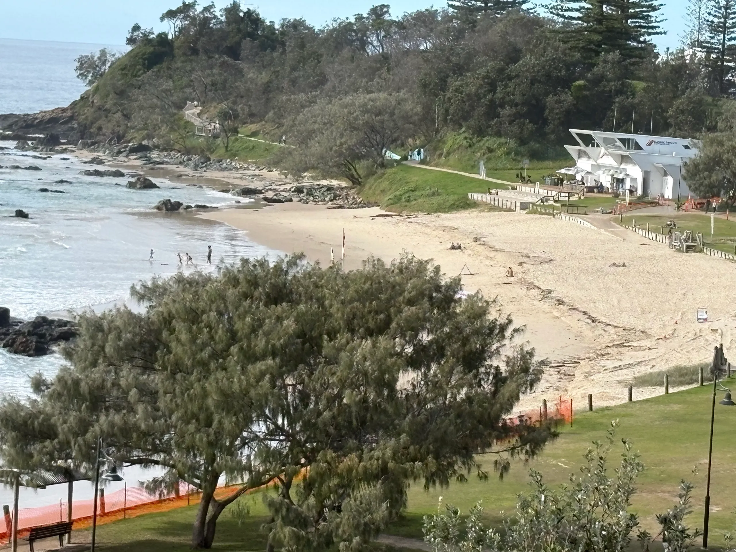 A surf beach below the headland near the centre of Port Macquarie