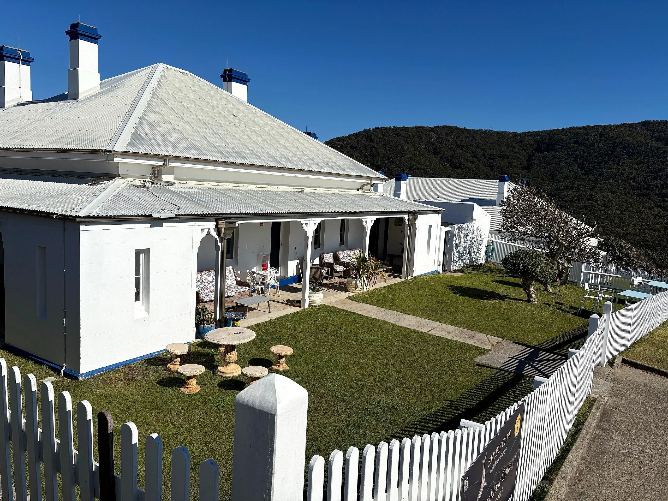 The lawn and verandah of the keepers' cottage at Smoky Cape