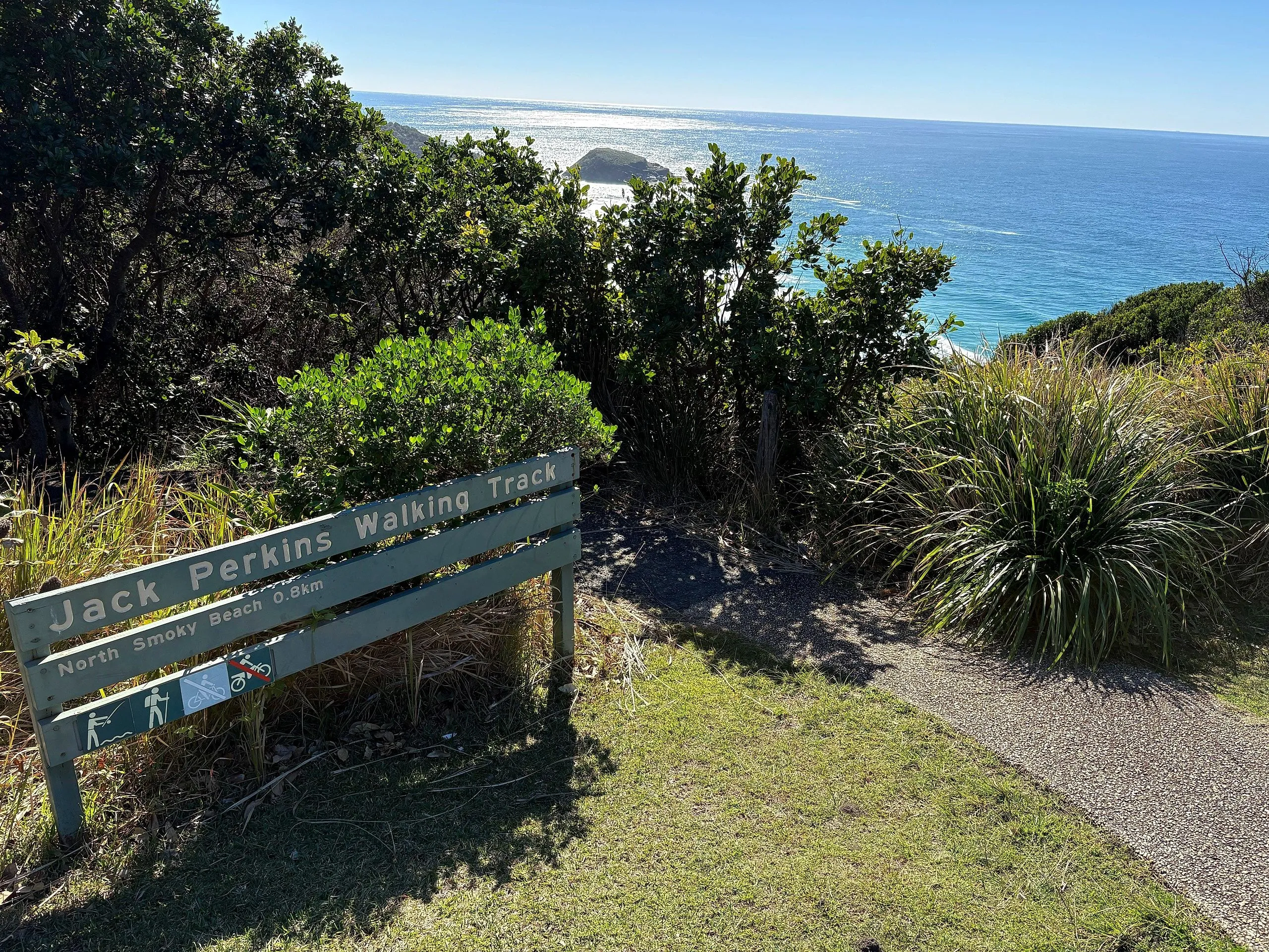 The Jack Perkins Walking Track sign at Smoky Cape, pointing to North Smoky Beach